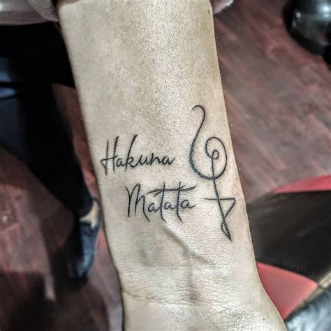 hakuna matata tattoo symbol|Unlocking the Profound Hakuna Matata Tattoo。